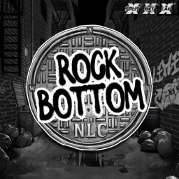 rock bottom with back allay in the background